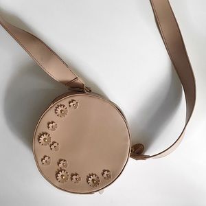 Studio 33 circle crossbody bag floral embellishment.